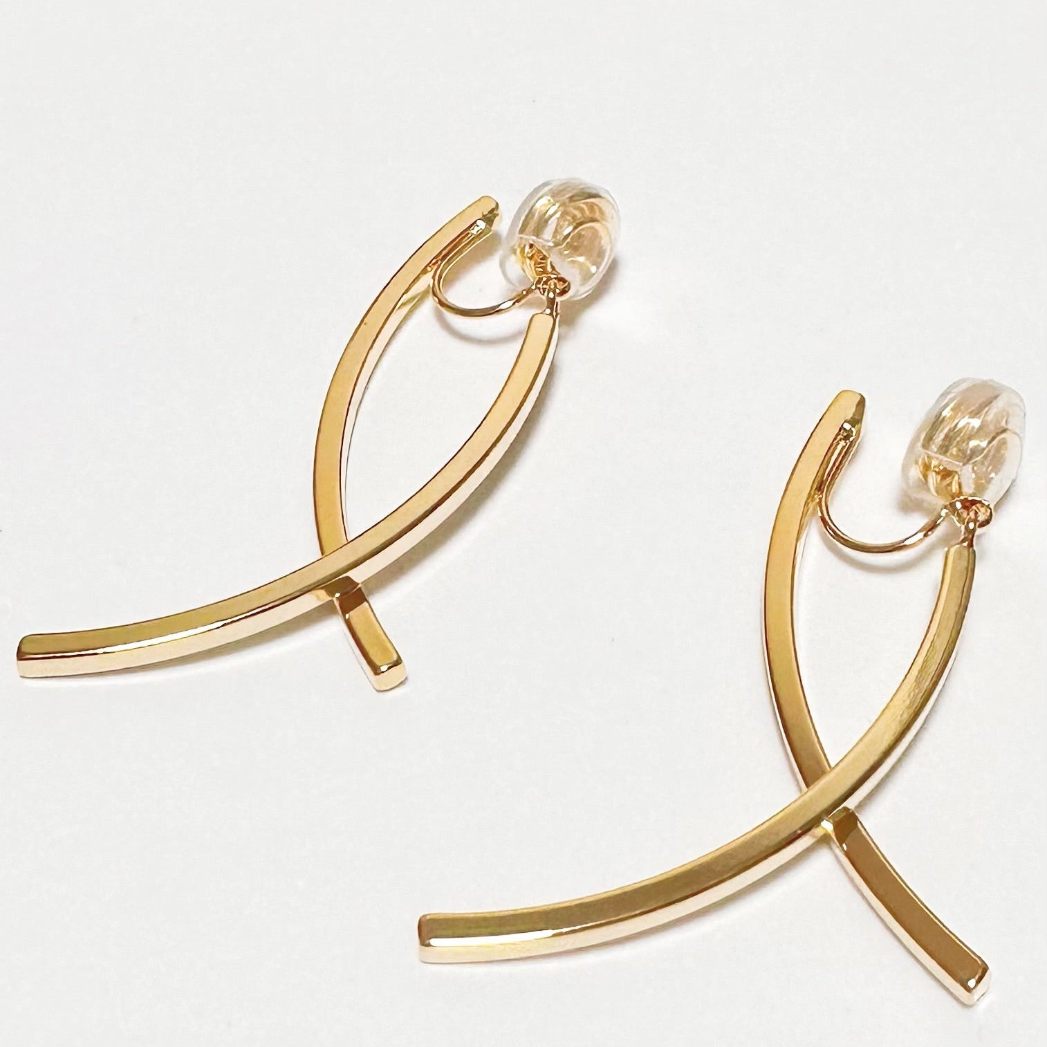 Curved Cross Drop Clip-On Earrings