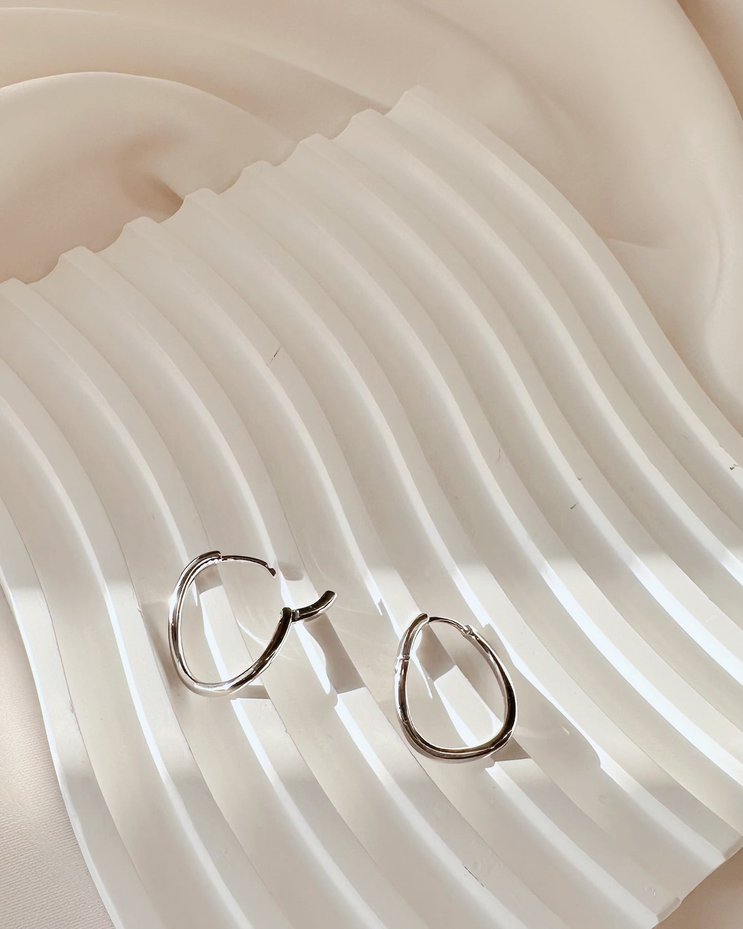 Silver Curved Hoops