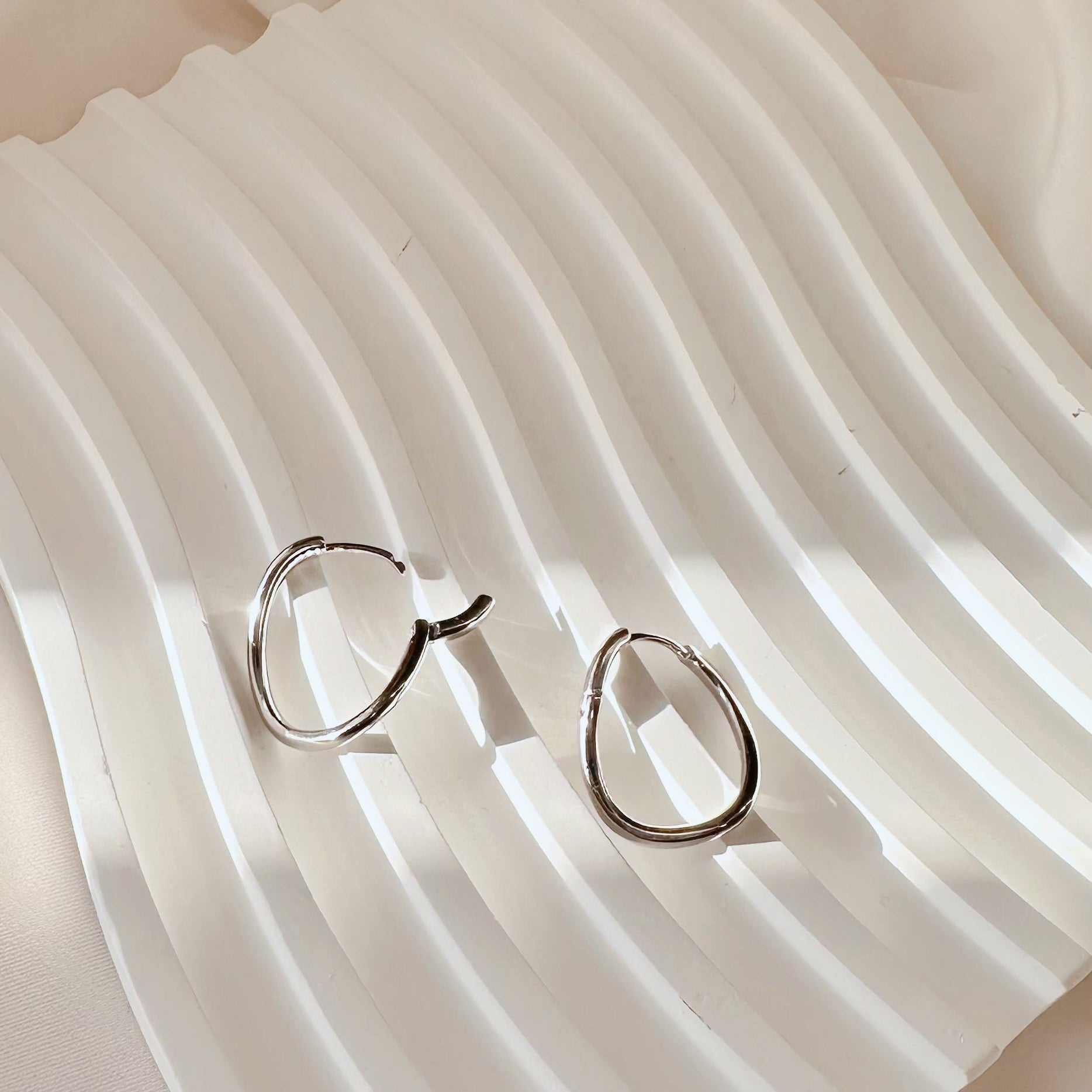 Silver Curved Hoops