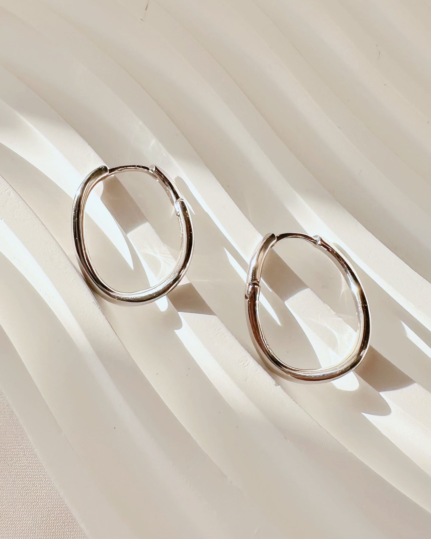 Silver Curved Hoops